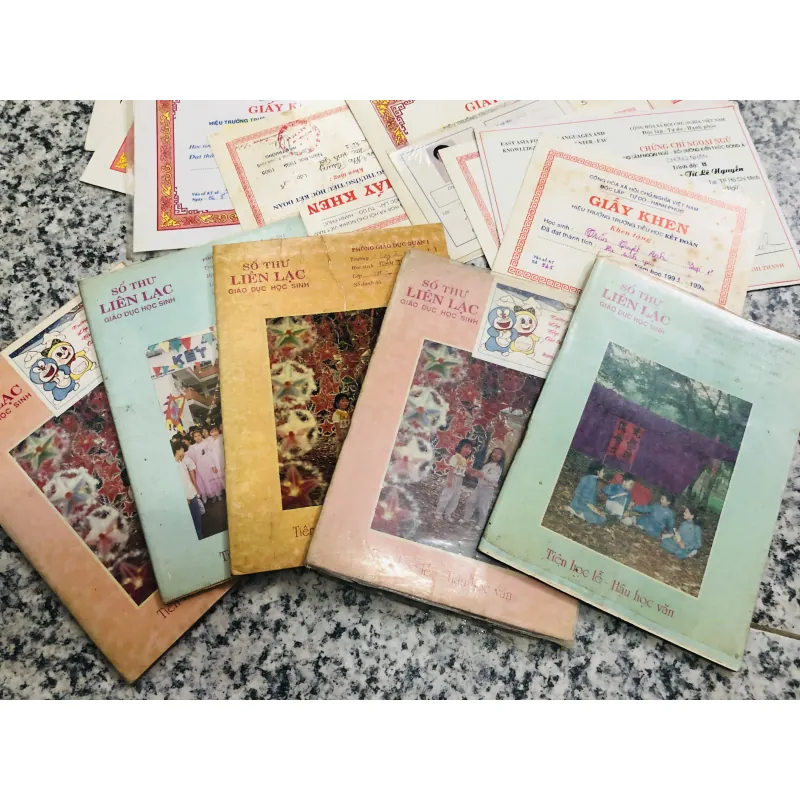 Lô sổ liên lạc + giấy khen 9x  994282