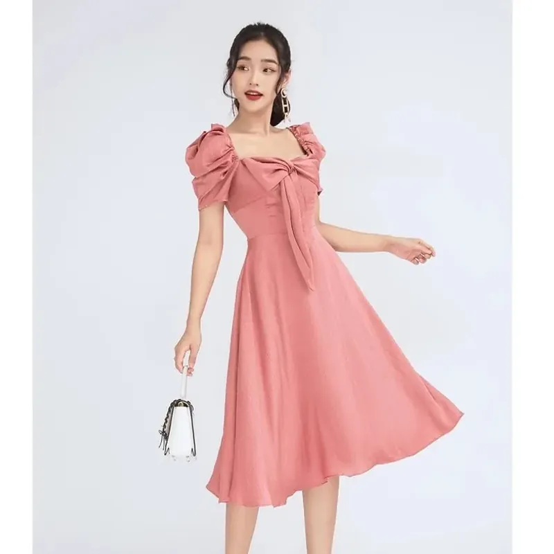 Đầm nữ cổ vuông tay phồng màu hồng đào 681639