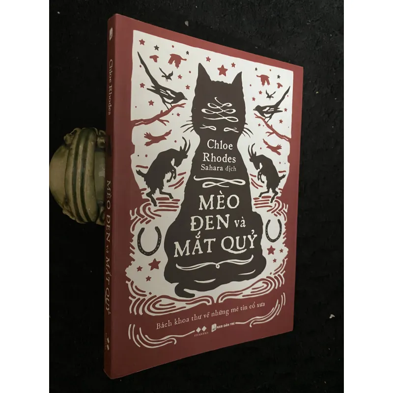 "Mèo Đen Và Mắt Quỷ" của tác giả Chloe Rhodes, do Sahara dịch 1030369