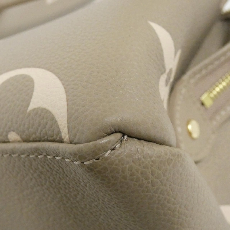 Túi Louis Vuitton Monogram Bicolor Empreinte Petit Palais PM M58914 616150