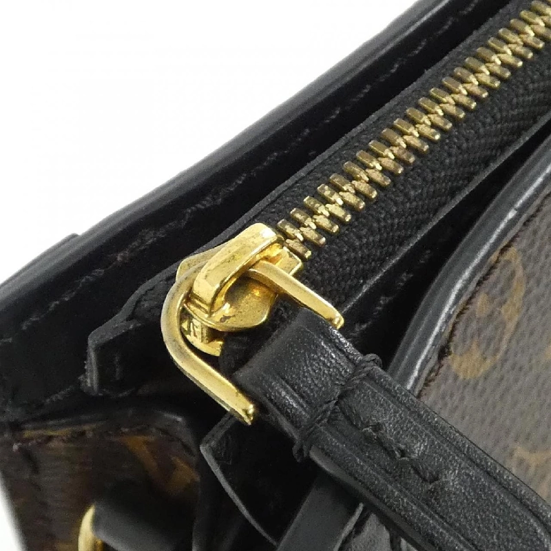 Túi xách đeo vai Louis Vuitton Monogram Reverse Trunk Clutch M43596 - Hàng hiệu Authentic 802693