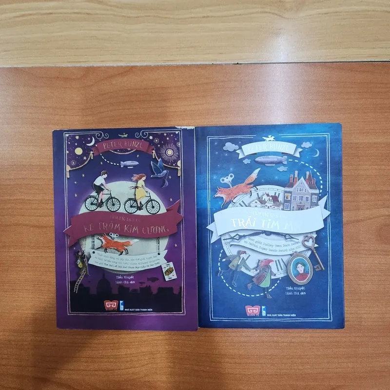 Sách combo 2 quyển Kẻ trộm kim cương & Trái tim máy của Pêtr Bunzl mới 90% 531601