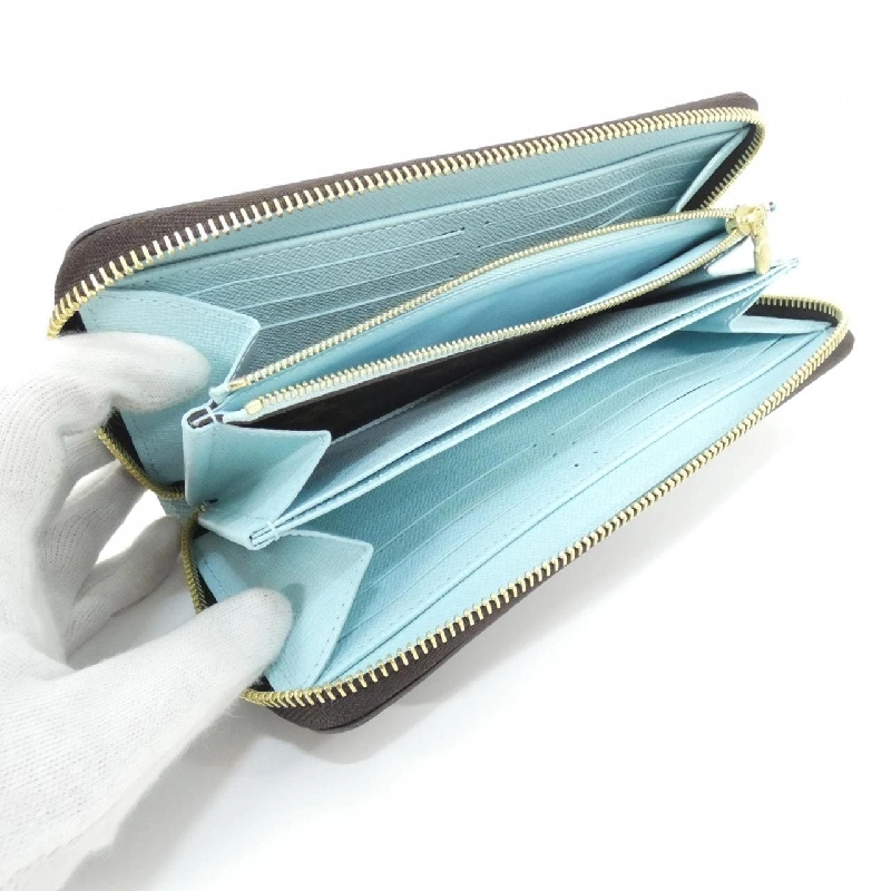 Ví Zippy Louis Vuitton Monogram (Vivienne Holiday) M12223 - Hàng hiệu Chính hãng 806534