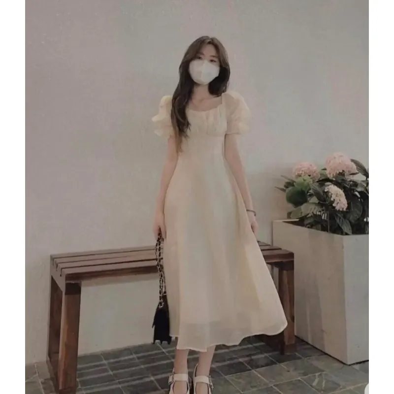 Đầm nữ cổ điển nhẹ nhàng phối túi xách hợp đi chơi, dạo phố 792589