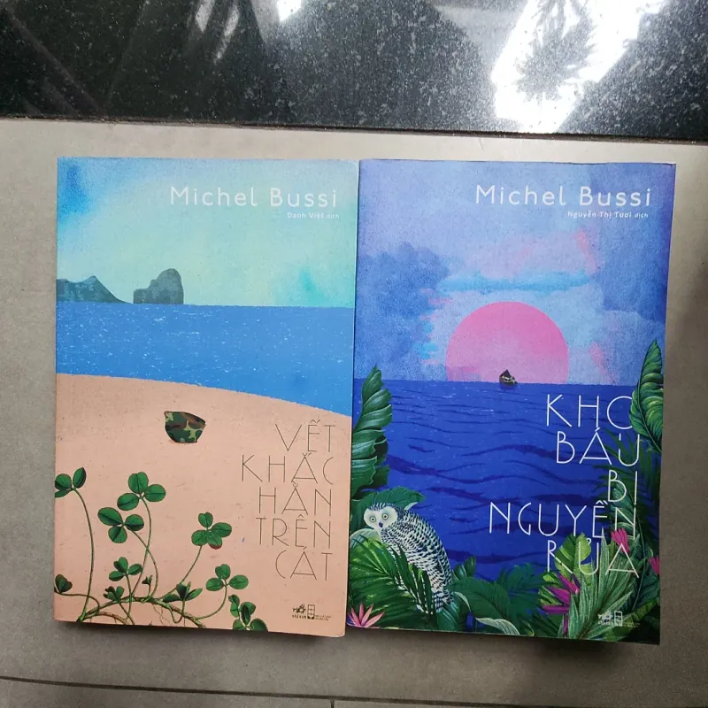 Sách combo 2 quyển Kho báu bị nguyền rủa và Vết khắc hằn trên cát của Bussi 503542