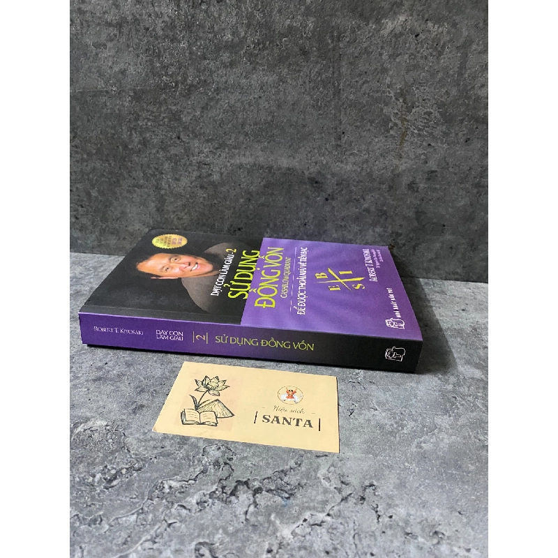 Dạy con làm giàu-2 Sử dụng đồng vốn- sách lưu kho chưa qua sd,giấy ố theo thời gian 790614