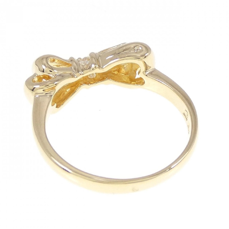 Nhẫn kim cương K18YG hình ruy băng 671412