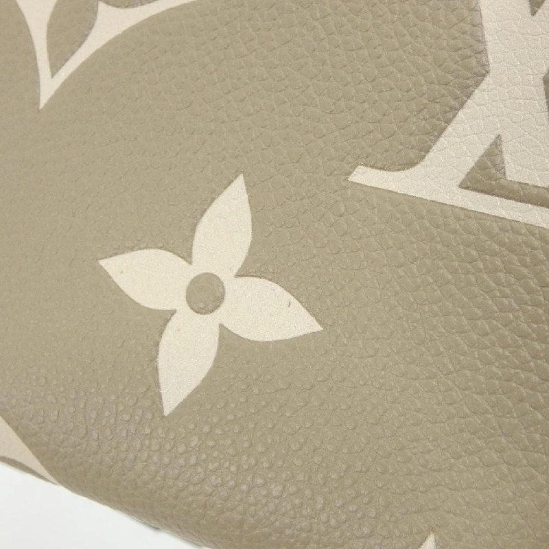 Ví Zippy Monogram Empreinte Hai Màu Louis Vuitton M69794 620990