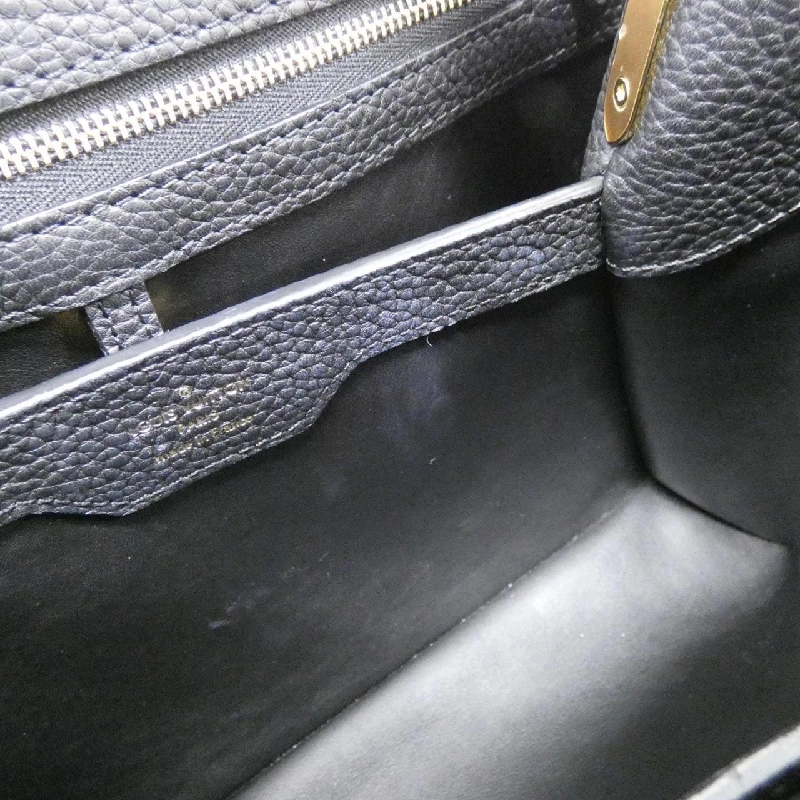 Túi Louis Vuitton Flower Capucines MM M53662 614719