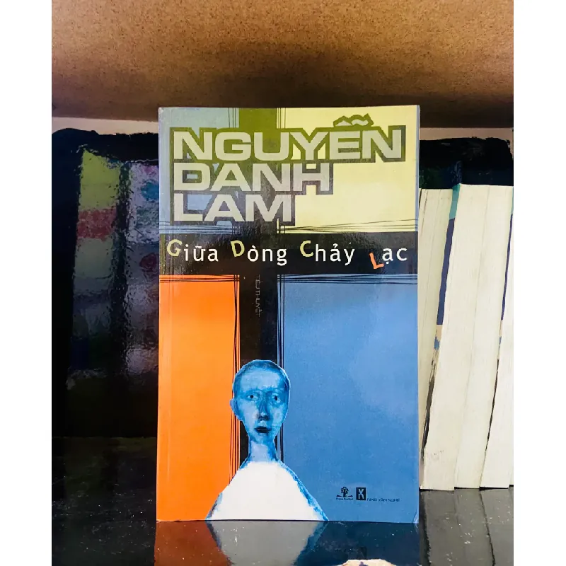 Giữa dòng chảy lạc - Nguyễn Danh Lam 554623