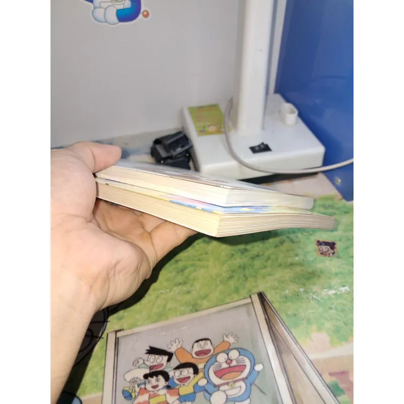 Doreamon truyện màu và tanaka lúc nào cũng vật vờ 698448