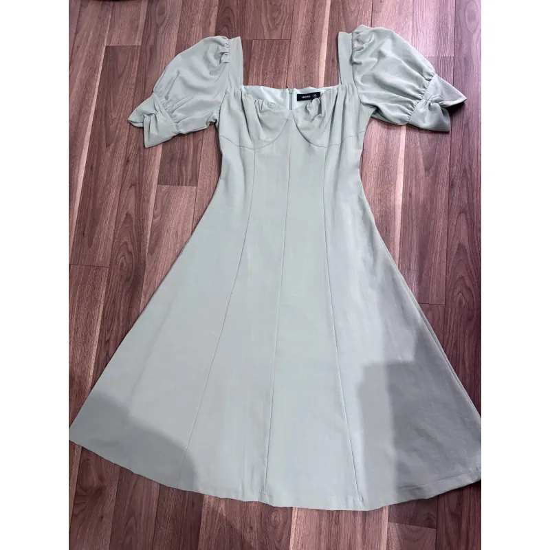 Đầm nữ màu xanh ngọc 1013407