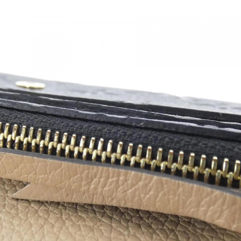 Ví Louis Vuitton Monogram Empreinte Portefeuille Émilie M62369 - Hàng hiệu Authentic 806217