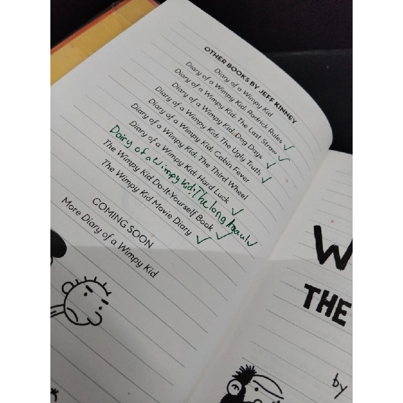 Diary of a wimpy kid 9 The long haul (bìa cứng) mới 80% bẩn bìa, ố nhẹ, có chữ viết trang đầu HCM1712 Jeff Kinney NGOẠI VĂN 355209