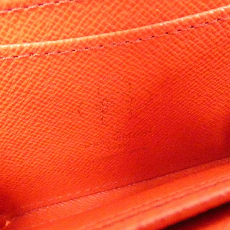 Ví tiền xu Zippy Monogram (Candy Factory) M12210 của Louis Vuitton 621349