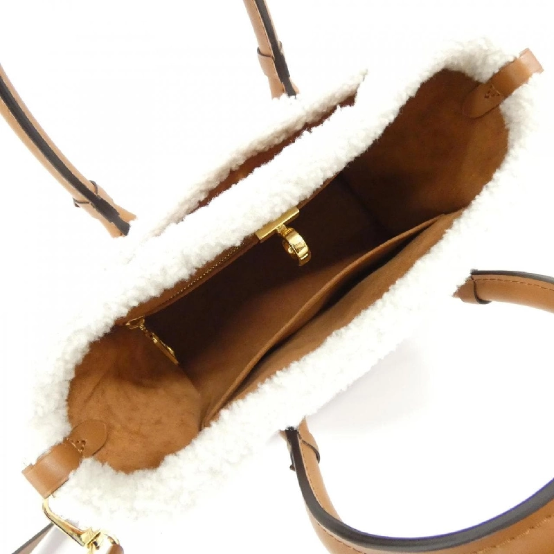 Túi Louis Vuitton On My Side PM M58918 618934