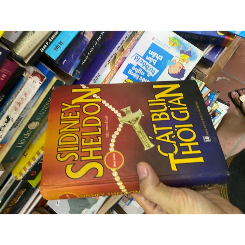 Sách cát bụi thời gian - Sidney Sheldon 312102