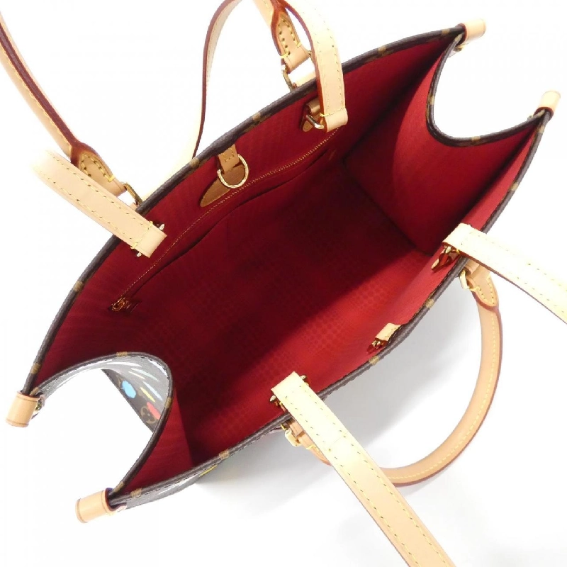 Túi Louis Vuitton Monogram (LV X YK) On The Go MM M46379 617936