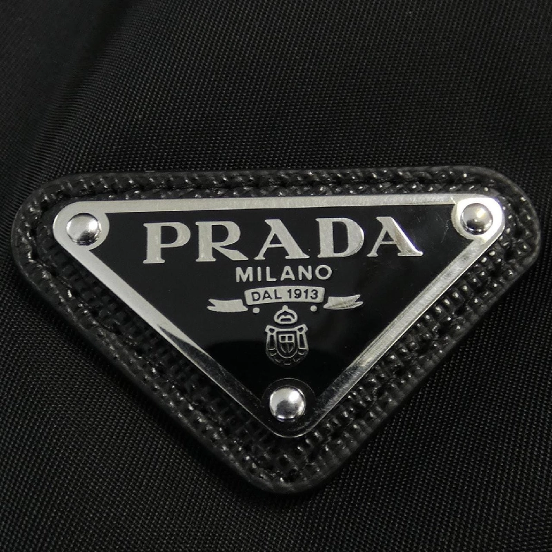 Áo khoác lông vũ PRADA logo hình tam giác 29Y955 S212 1WQ8 632811