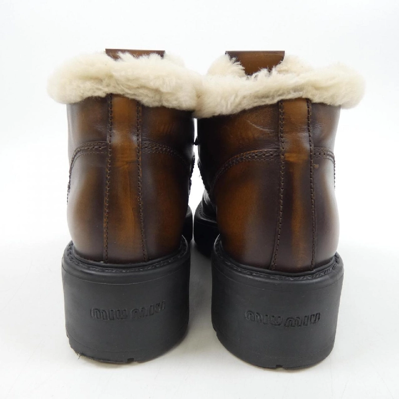 Giày bốt MIU MIU 662386