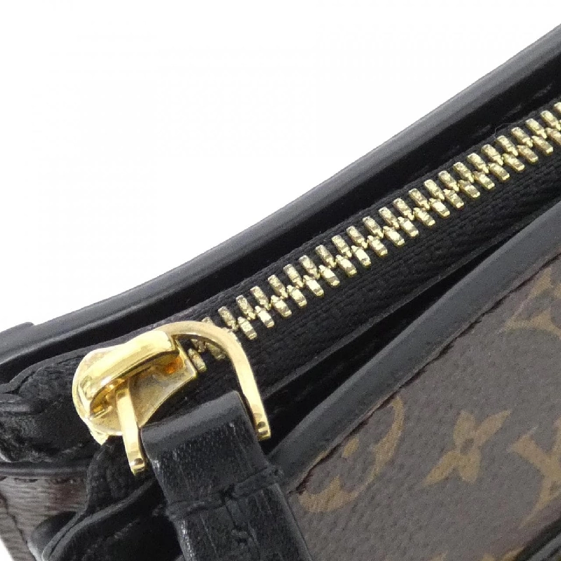 Túi xách vai Louis Vuitton Monogram Reverse Trunk Clutch M43596 610903