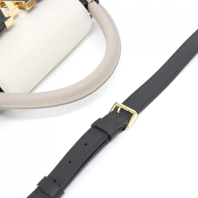 Túi Louis Vuitton Capucines MM M25386 615535