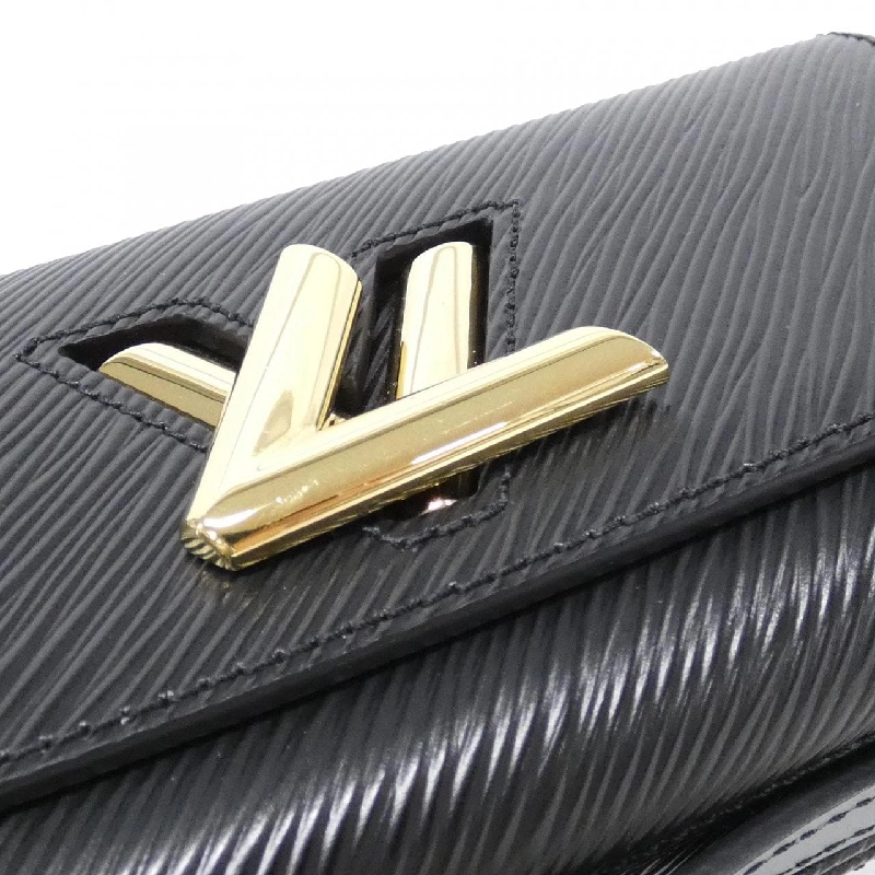 Túi xách Louis Vuitton Epi Pochette Twist West M83077 - Hàng hiệu Chính hãng 764824