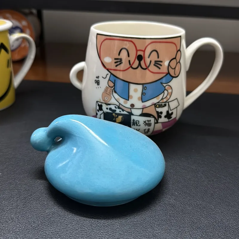 Bộ 2 ly sứ hình mèo và mặt cười 957687
