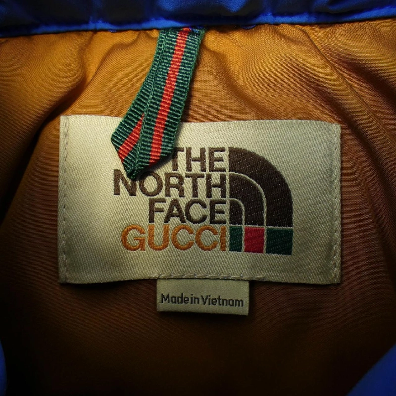 Áo khoác lông vũ GUCCI×THENORTHFACE - Hàng hiệu Authentic 896797