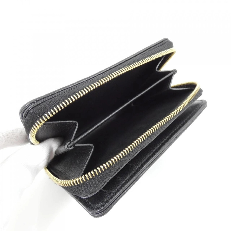 Ví Louis Vuitton Kusson Portefeuille Rue M81599 622282