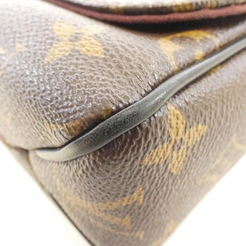 Túi đeo vai Louis Vuitton Monogram Macassar District PM M40935 610077