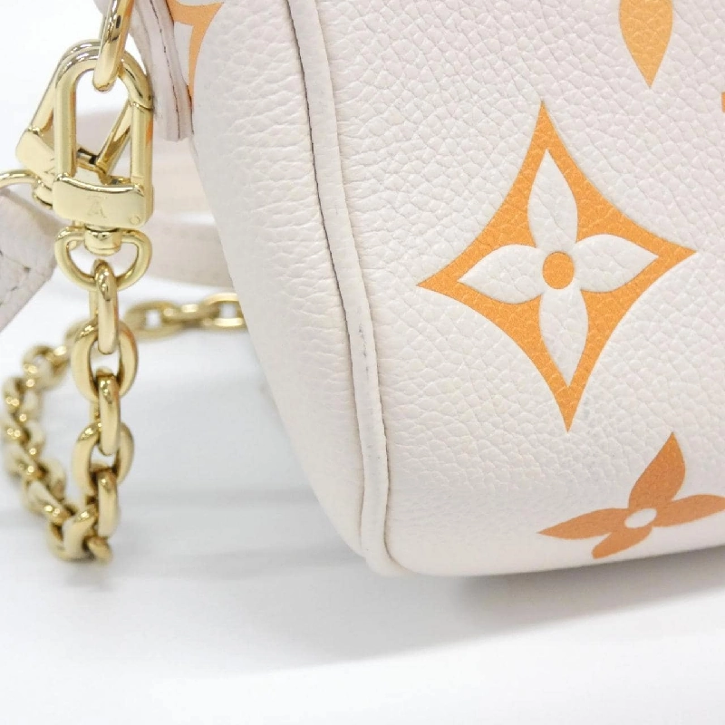 Túi đeo chéo Louis Vuitton Monogram Empreinte (By the Pool) Mini Bum Bag M82208 - Hàng hiệu Chính hãng 765486