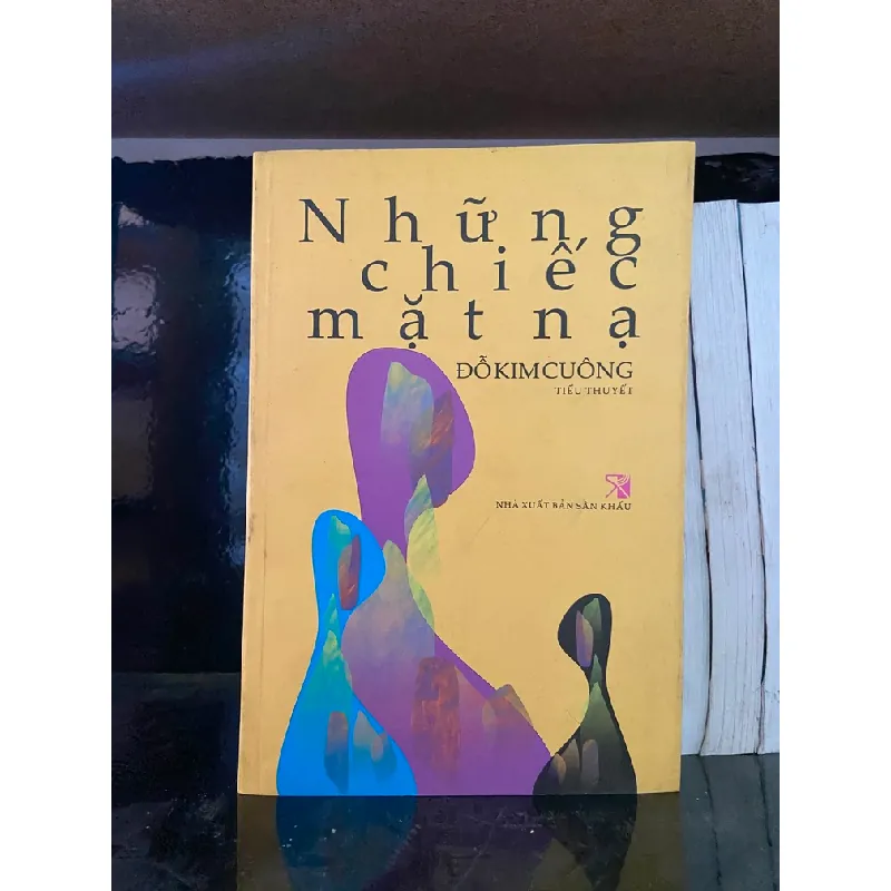 Những chiếc mặt nạ - Đỗ Kim Cuông 555524