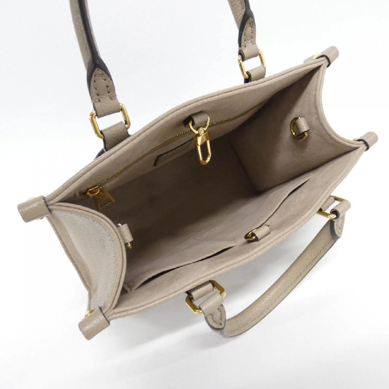 Túi Louis Vuitton Monogram Bicolor OnTheGo PM M45779 614553