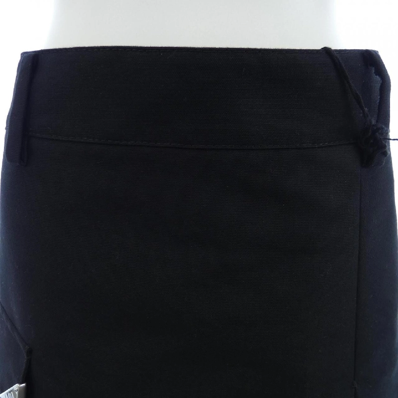 Váy hình tam giác logo kỹ thuật PRADA 21H940 S231 11HJ 647529