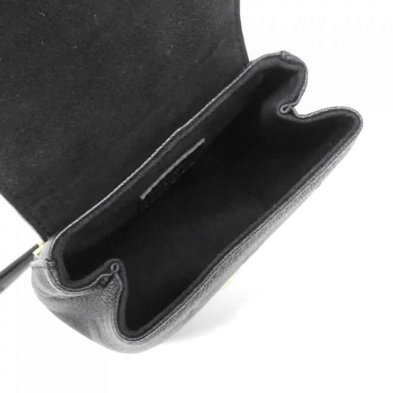 Ba lô Tiny Monogram Empreinte Louis Vuitton M80596 611183