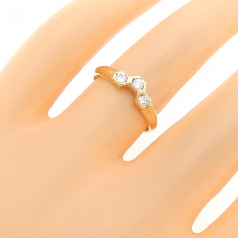 Nhẫn kim cương ba viên K18YG 0.17CT 670679