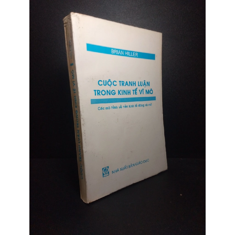 Cuộc tranh luận trong nền kinh tế vĩ mô 1995 - Brian Hiller new 90% (có mộc in) HPB.HCM3010 321754