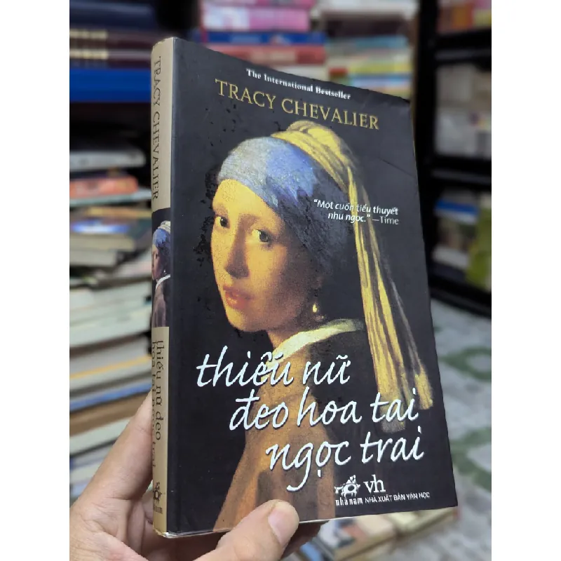Thiếu nữ đeo hoa tai ngọc trai - Tracy Chevalier 129440