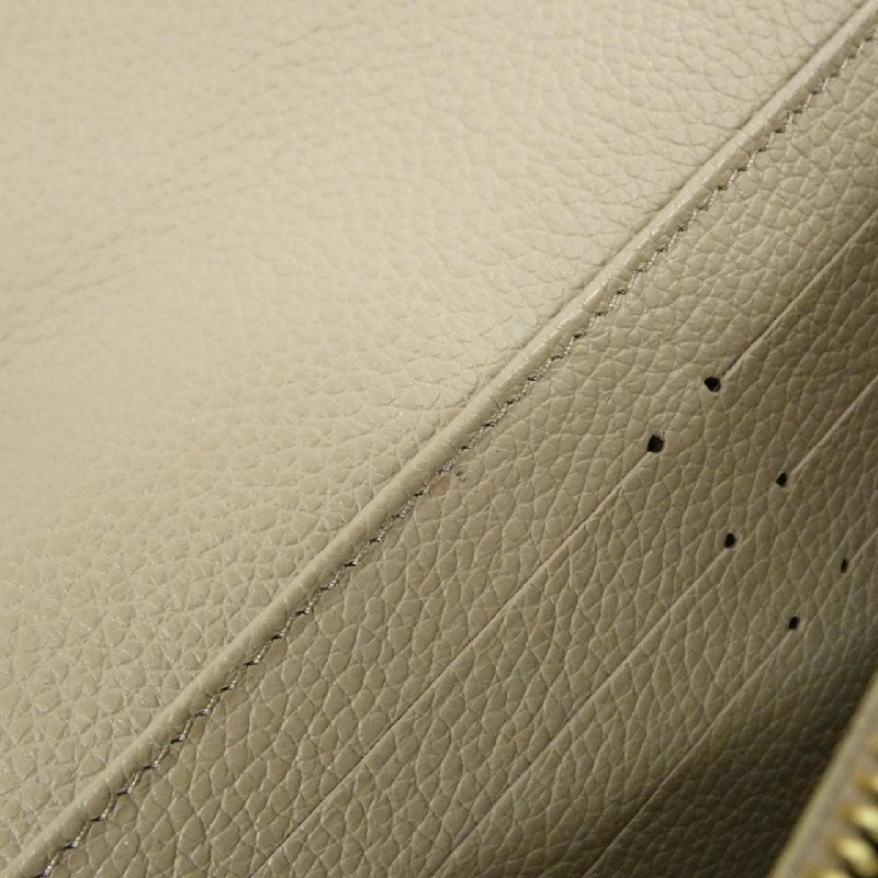 Ví Louis Vuitton hai màu Monogram Empreinte Portefeuille Sarah M81049 622800