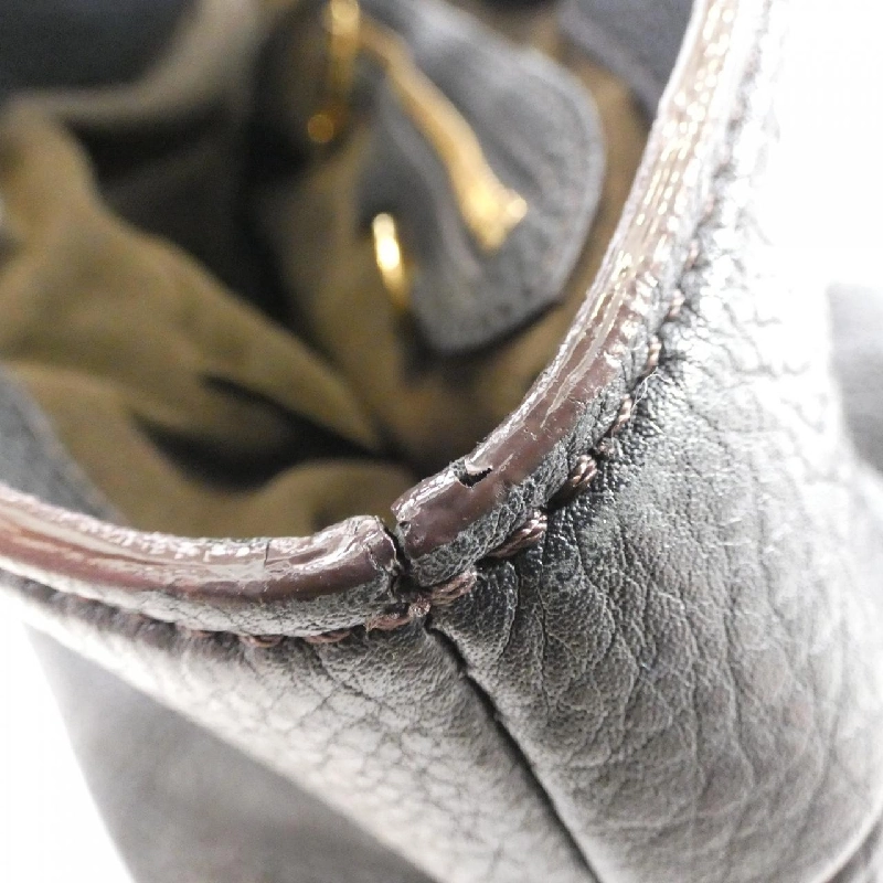 Túi Louis Vuitton Mahina Shire PM M93465 618083