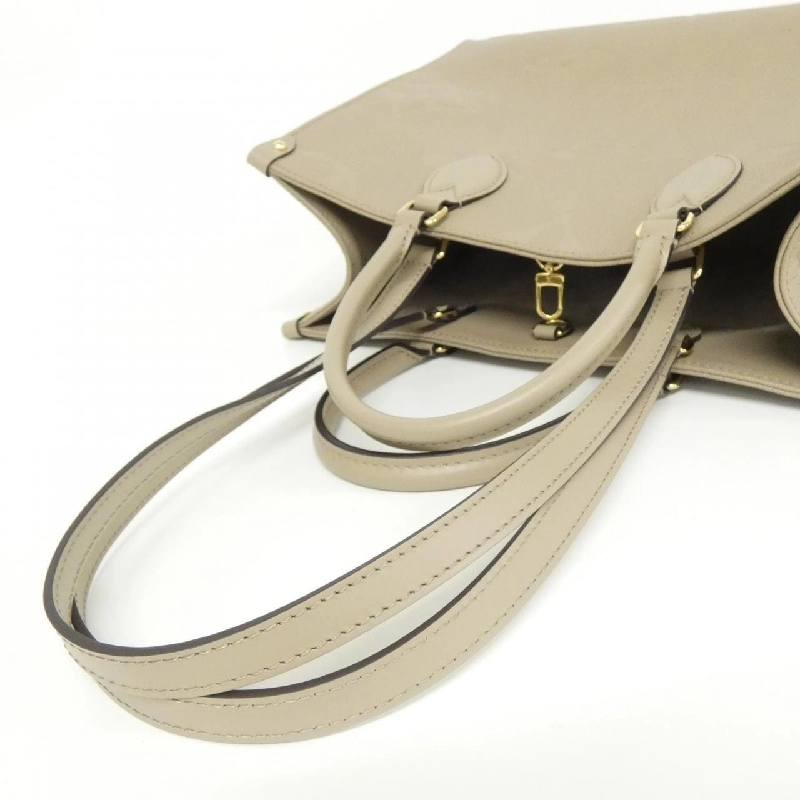 Túi Louis Vuitton Monogram Empreinte OnTheGo MM M45607 614667