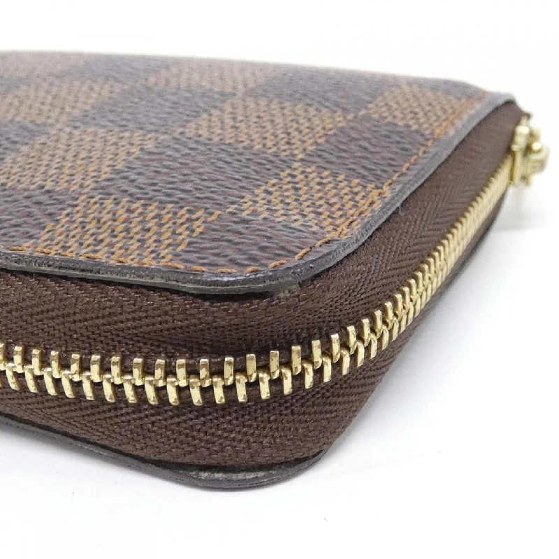 Ví tiền xu Louis Vuitton Damier Zippy N63070 620649