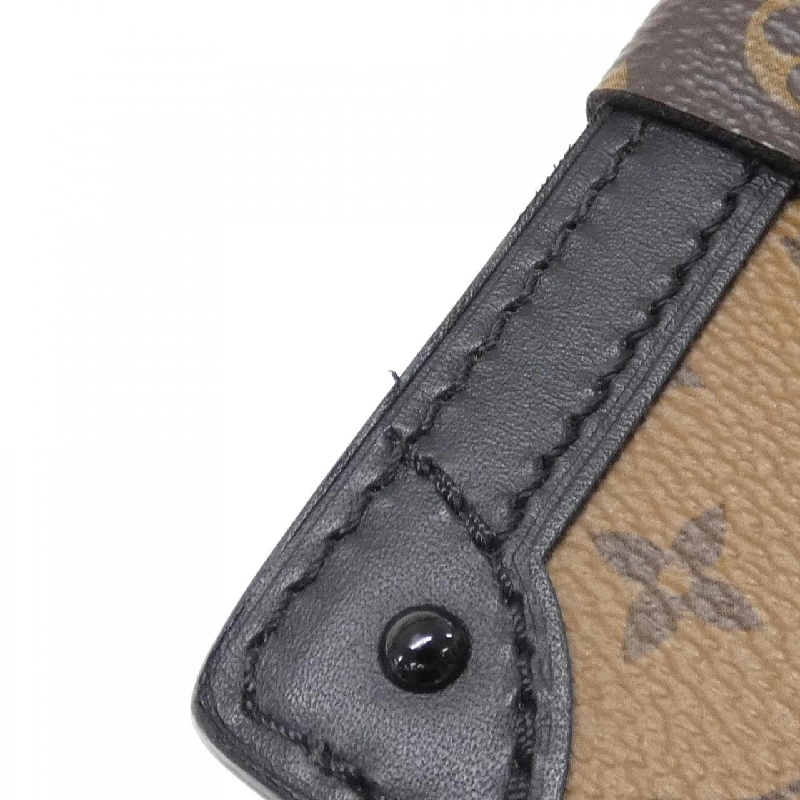 Túi xách đeo vai Louis Vuitton Monogram Reverse Trunk Clutch M43596 612081