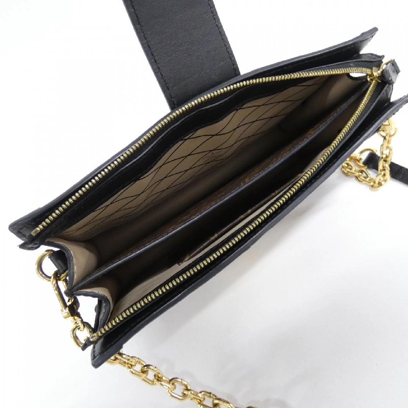 Túi xách đeo vai Louis Vuitton Monogram Reverse Trunk Clutch M43596 611712