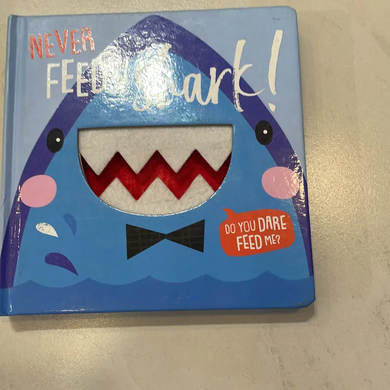 NGOẠI VĂN tiếng anh trẻ em : Never Feed a Shark ! - sách bìa cứng dày đẹp - tương tác  1027550