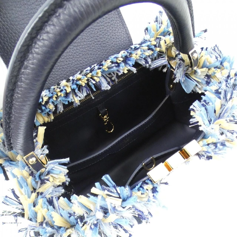 Túi Louis Vuitton Capucines MM M22220 616545