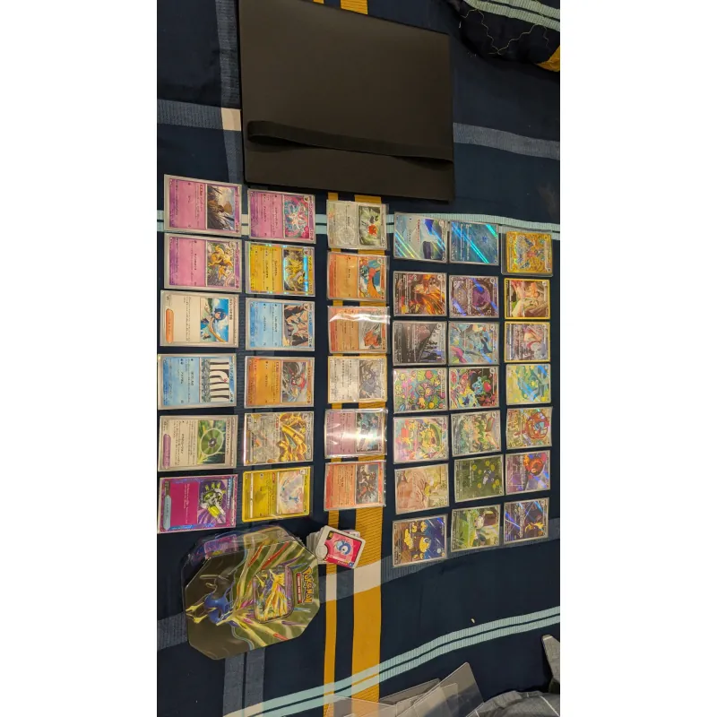 Thẻ bài Pokemon TCG và hộp thiếc như hình 785189