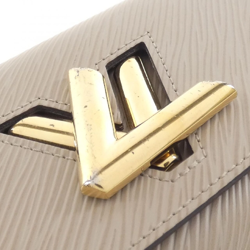 Ví Louis Vuitton Epi Portefeuille Twist M67510 621688