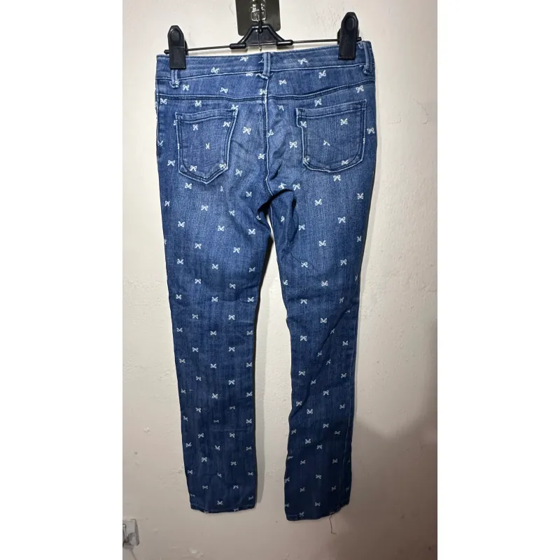 Quần jeans nữ slimfit thắt nơ họa tiết nơ nhỏ màu xanh đậm 734231